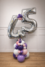 Load image into Gallery viewer, Silver number 45 balloon with pink, purple, and white balloons on a wooden floor.