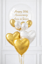 Load image into Gallery viewer, Heart-shaped balloons in gold and white with 'Happy 50th Anniversary Anne & Simon' text on a white background.