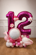 Load image into Gallery viewer, Pink and white balloon arrangement with number '12' and a smaller balloon with 'Happy Birthday' text.
