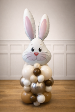 Load image into Gallery viewer, Balloon sculpture of a rabbit with 'Noah' written on it against a neutral background
