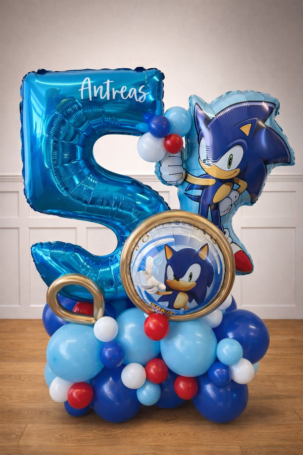 Balloon arrangement with number '5' and Sonic the Hedgehog character on a wooden floor.