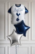 Load image into Gallery viewer, Balloon shaped like a Tottenham Hotspur football shirt with 'Best Dad' text against a white paneled wall.
