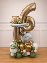 Load image into Gallery viewer, Gold and green balloon arrangement with number '6' and 'Happy Birthday' text on a wooden floor.
