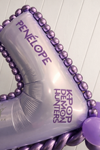 Load image into Gallery viewer, PENÓLOPE product with purple beads and text on a white background
