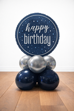 Load image into Gallery viewer, Balloon arrangement with a 'happy birthday' sign on a wooden floor.
