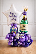 Load image into Gallery viewer, purple and silver balloon base with a personalised star attached and a champagne bottle
