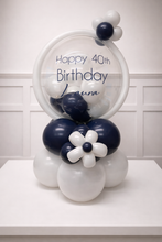 Load image into Gallery viewer, Navy and white balloon arrangement with a personalized message on a white surface.
