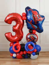 Load image into Gallery viewer, Balloon arrangement with number '3' and Spider-Man design on a wooden floor.
